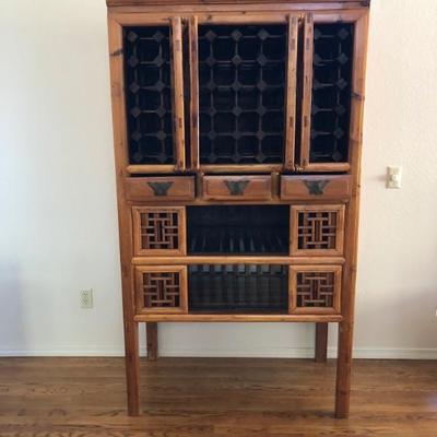 Chinese Kitchen, Pantry, Wine Cabinet. Top Doors open to display wine rack.  Three drawers in the middle and two bottom shelves with...