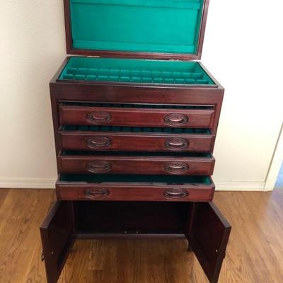 Rosewood Flatware chest with 4 drawers and bottom shelf.