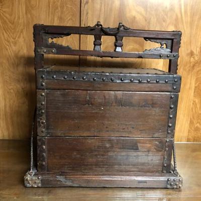 Antique hardwood and iron one piece food carrier with 2 compartments  made in Tong mu came from Shanxi Province. Circa 1800's. 
