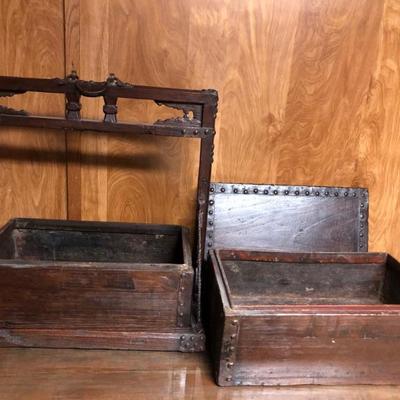 Antique hardwood and iron one piece food carrier with 2 compartments  made in Tong mu came from Shanxi Province. Circa 1800's. 