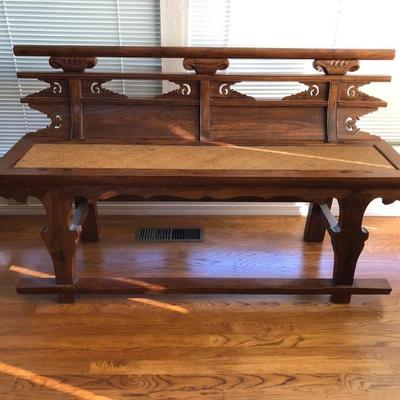 Beautifully handcrafted Antique Chinese 'village bench'  with high back, foot rest, wicker inset seat.  Measures approx. W: 60.3/4in |...