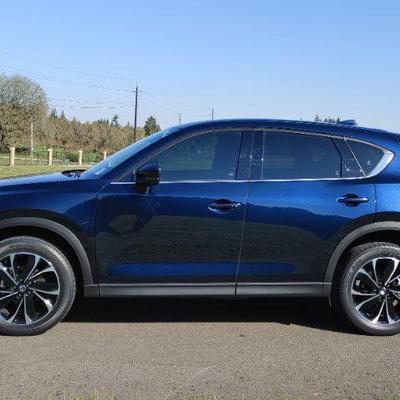 2022 Mazda CX-5.
Like new with only 6200 miles!