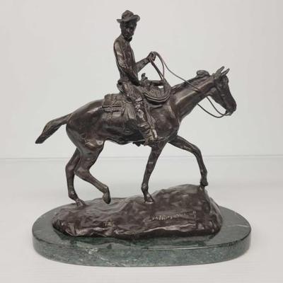 #7028 â€¢ C.M Russell Cowboy Statue 22/100 Bronze
