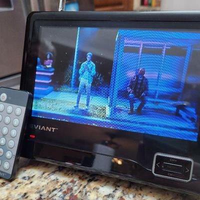 Eviant Tabletop portable Television with remote and charging cords