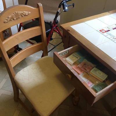 Monopoly table with game pieces & 4 chairs