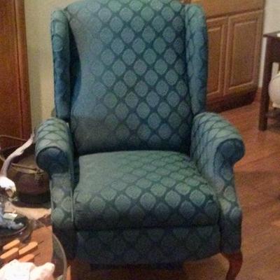 Green upholstered recliners one of 2
