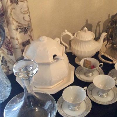 White covered soup tureen, tea pot, tea cups and saucers