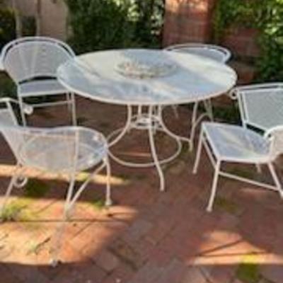 One of 4 patio table sets