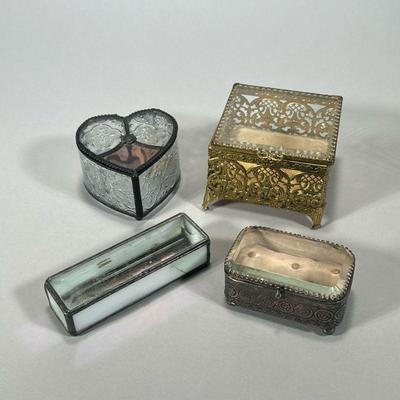 (4PC) METAL & GLASS JEWLERY CASES | Includes: silver jewelry box with stamped flowers and glass top, square gilt jewelry box with glass...