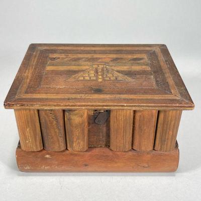 INLAID WOOD “TRICK” BOX | Carved wooden “trick” box with secret bottom compartment inlaid with pyramid design on top