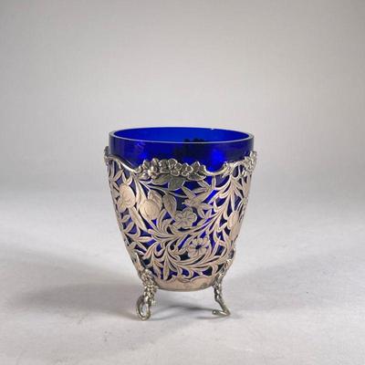 SILVER PLATE & COBALT GLASS BOWL | Cobalt blue glass bowl with silver plate holder showing fruits amongst vines