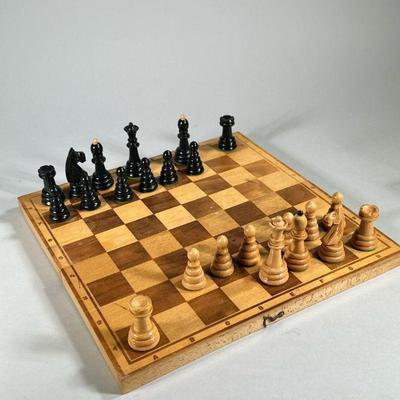 WOOD CARVED FOLDING CHESS BOARD | Folding wooden chessboard with carved wood pieces marked 