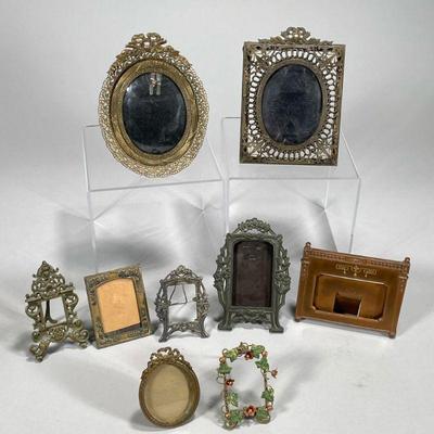 (9PC) SMALL DECORATIVE PICTURE FRAMES | Mostly metal.