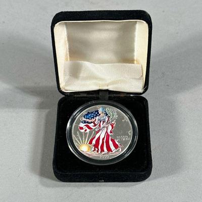 1999 AMERICAN EAGLE COLORIZED SILVER DOLLAR | 1999 Colorized American Eagle pure silver dollar coin
Coin diameter: 2in
