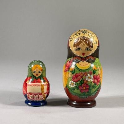(2PC) PAIR RUSSIAN NESTING DOLLS | Pair of Russian nesting dolls, signed with same signature in Russian on bottom