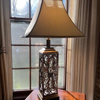 Rectangular metal lamp with wood base and wood finial. Rectangular shade