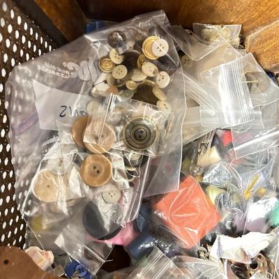 Vintage and antique buttons in sewing box