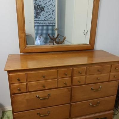Mid century Hard rock maple dresser and mirror. 