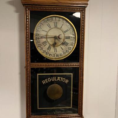 Lots of antique clocksâ€”mantel clocks, grandmother clocks and wall clocks