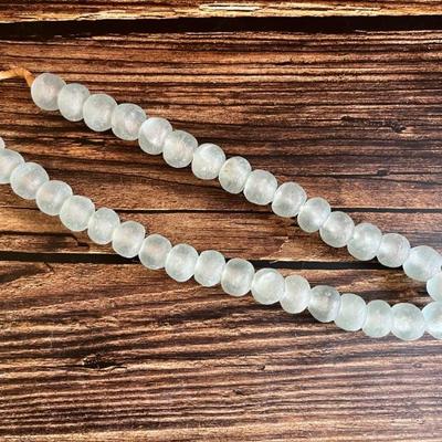 Strand of large tumbled white glass beads, like sea glass