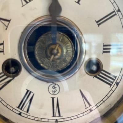 Lots of antique clocksâ€”mantel clocks, grandmother clocks and wall clocks