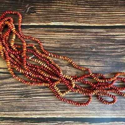 Indonesian necklace of red and orange seeds
