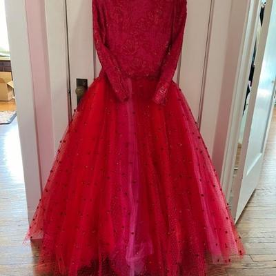 1980s Bob Mackie couture dress in red, red and hot pink lace bodice with full tulle skirt layered in red, lavender, pink and orange with...
