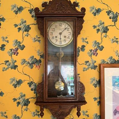 Antique wall clock by Watkins