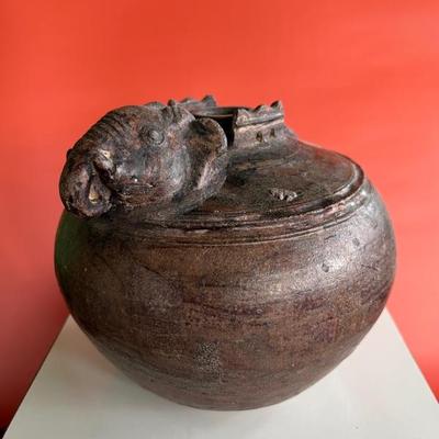 Khmer 12th century pot with elephant decoration on the lid, pottery with bronze colored glaze