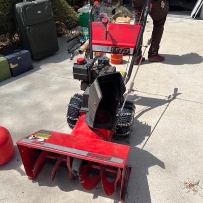 A big monster MTD snowblower! This snowblower means business (even has chains on the tires) with an all steel body. SHE WORKS! I took a...