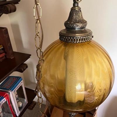 Lots of mid century lighting--oversized table lamps, some really great swag lamps