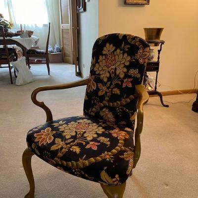 mid century open style arm chair with great black and orange fabric
