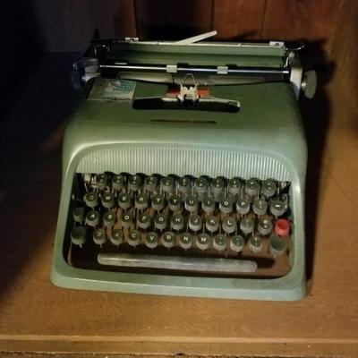 Vintage Underwood Olivetti portable typewriter