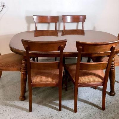 NIAB207 Dining Room Table & Chairs	Solid wood, Unknown manufacturer of the table, comes with 2 leafs to extend the table.Â 
