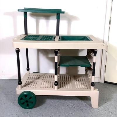 NIAB209 Suncast Rolling Garden Cart	Made out of hard plastic, comes with 2 plastic wheels for easy moving. Has utility hooks and a upper...