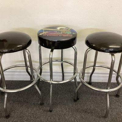 NIAD111 Shop Stools Trio	Tallest stool depicts diner scene with cars. Tallest stool spins very easily and comfortably, while the shorter...