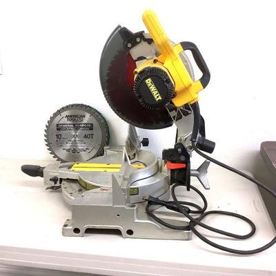 NIAB201 Dewalt Compound Miter Saw	Model # DW713. Has the safety guard and was tested and works. Comes with a few used 10