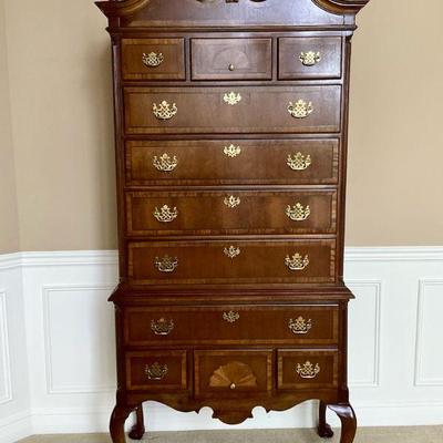 NIAD118 Queen Anne Style High Boy Tall Dresser	Very tall high boy! In very good condition. Claw feet. Comes in two pieces.Â 
