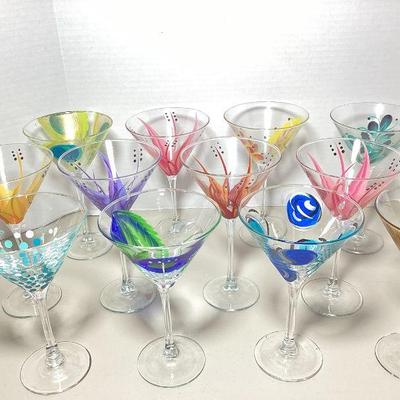 NIAD104 Collection Of Hand Painted Martini Glasses	12 in total. The last 4 glasses have slightly shorter stems.Â 
