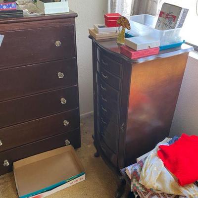 Chest of drawers and jewelry cabinet.