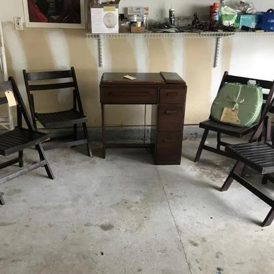 Singer sewing machine $50
set of 4 wooden folding chairs with set of cushions $69