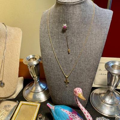14k yellow gold cross necklace and pink sapphire-mounted 14k and platinum stick pin, as well as a beautiful pink fishnet Herend swan...