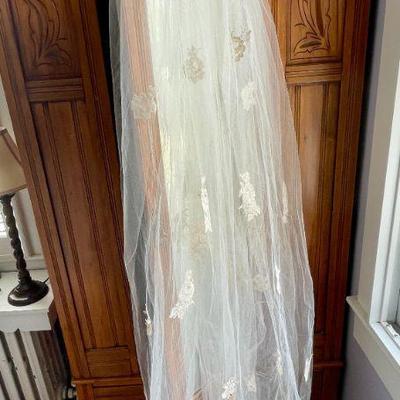 Detail of vintage Priscilla of Boston chapel-length embellished wedding veil