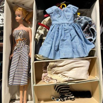 Vintage Barbie dolls with case and clothes