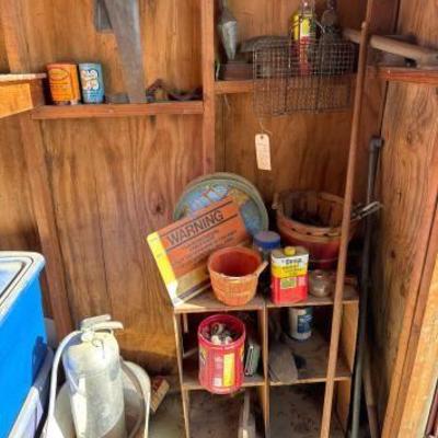 #1980 â€¢ Crates, Tins, Fire Extinguisher, Asbestos Irons, and AT&T Sign
