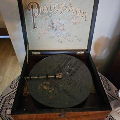 #3028 â€¢ Polyphon Disc Player with 11 Discs
