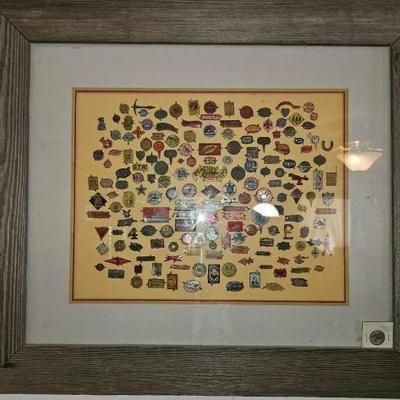 #3022 â€¢ Framed Collection of Metal Tobacco Tags
