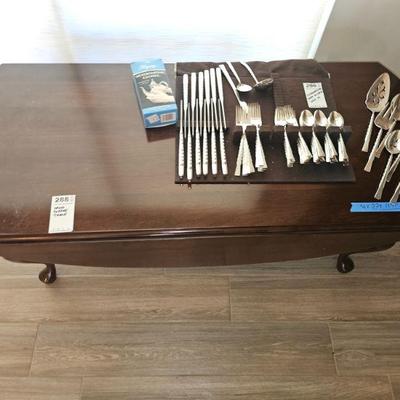 Table only, does not include flatware