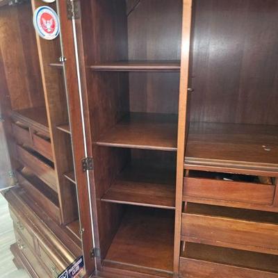 This a nicely constructed armoire, it has slight blemishes on the front of the cabinet