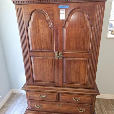 This a nicely constructed armoire, it has slight blemishes on the front of the cabinet